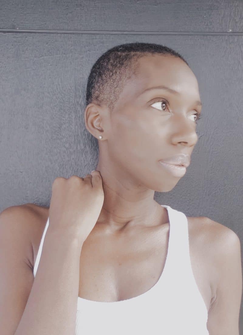 black woman pondering breast cancer diagnosis